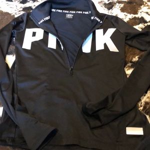 Pink zip up athletic top